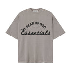 ESSENTIALS SS26 Training 90s Faded Seal — Camiseta y pantalón corto