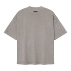 ESSENTIALS SS26 Training 90s Faded Seal — Camiseta y pantalón corto