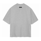 ESSENTIALS SS24 Gris Jaspeado Claro — Camiseta y Shorts