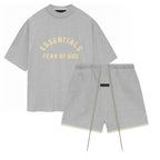 ESSENTIALS SS24 Gris Jaspeado Claro — Camiseta y Shorts