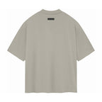 ESSENTIALS SS24 Gris Verde — Camiseta y Pantalones Cortos